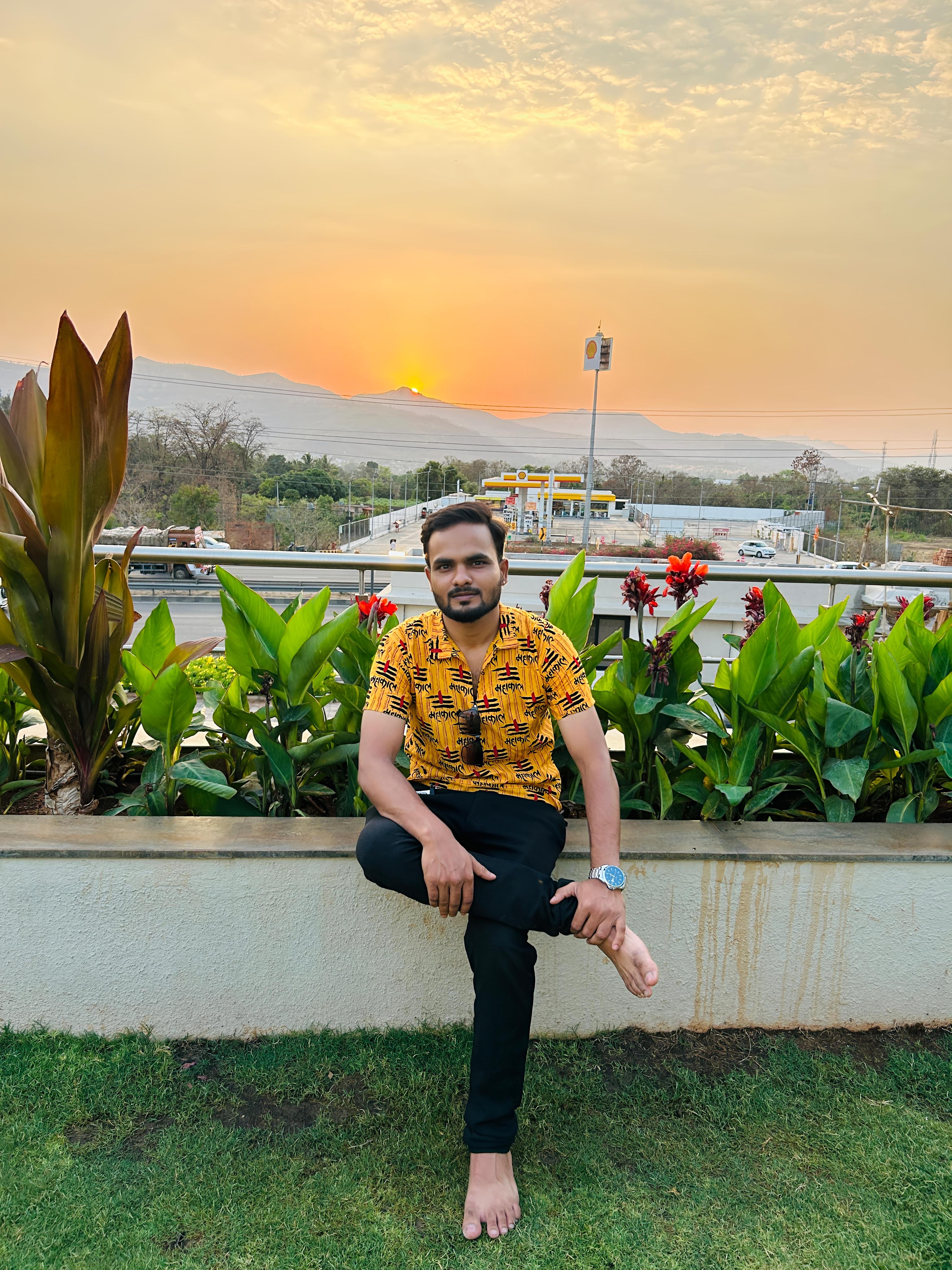 Sagar Gaikwad at sunset with mountain backdrop